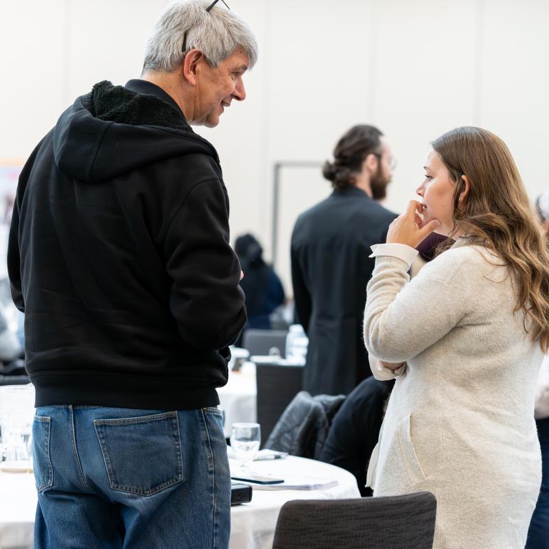 Two people talking
