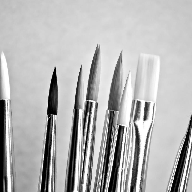 Artists paintbrushes depicting the art of working within career development